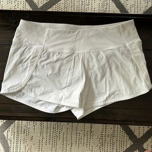 Size 8 white speed up shorts.